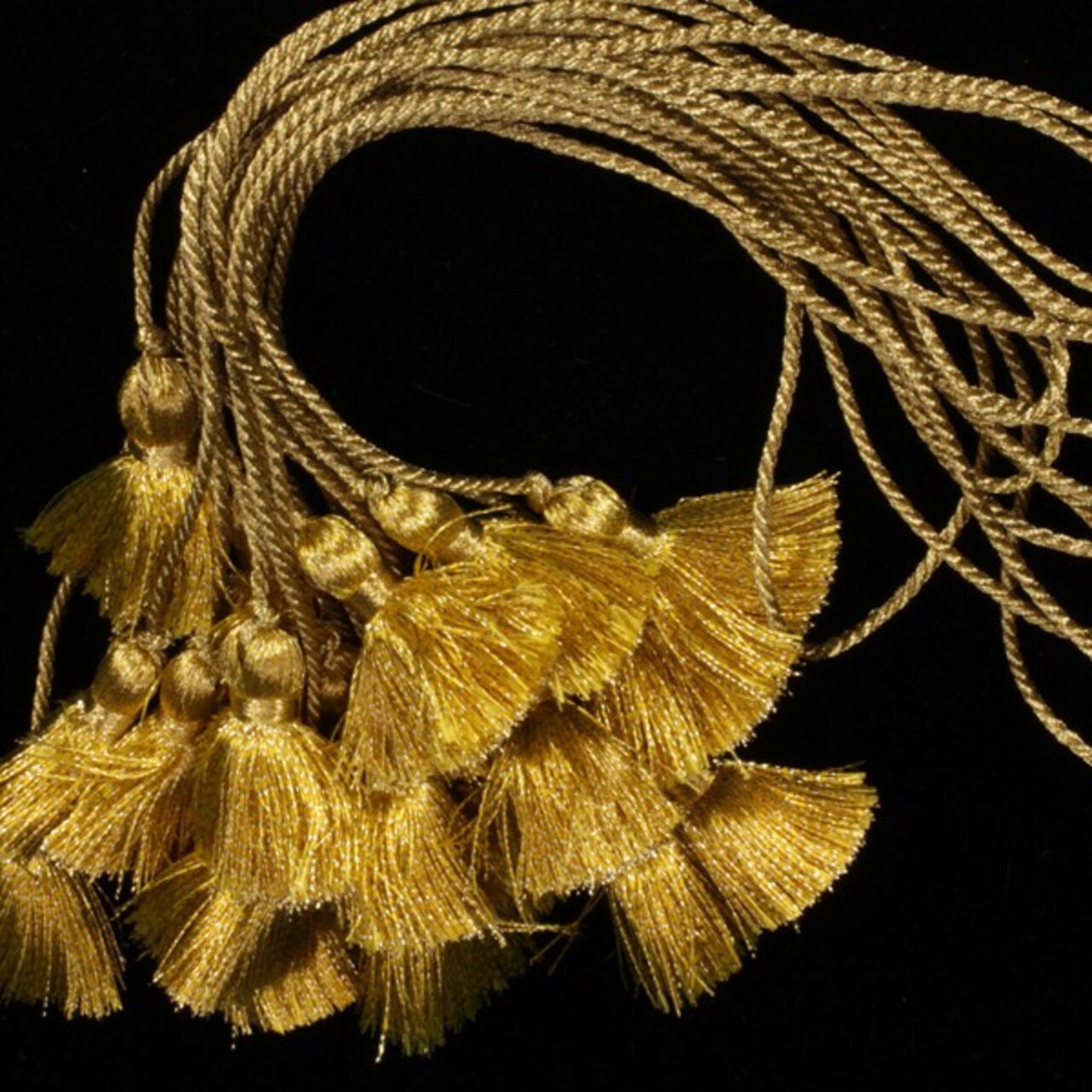The Ribbon People Pack of 10 Small Beautiful Shimmering Antique Gold  Tassels 35mm
